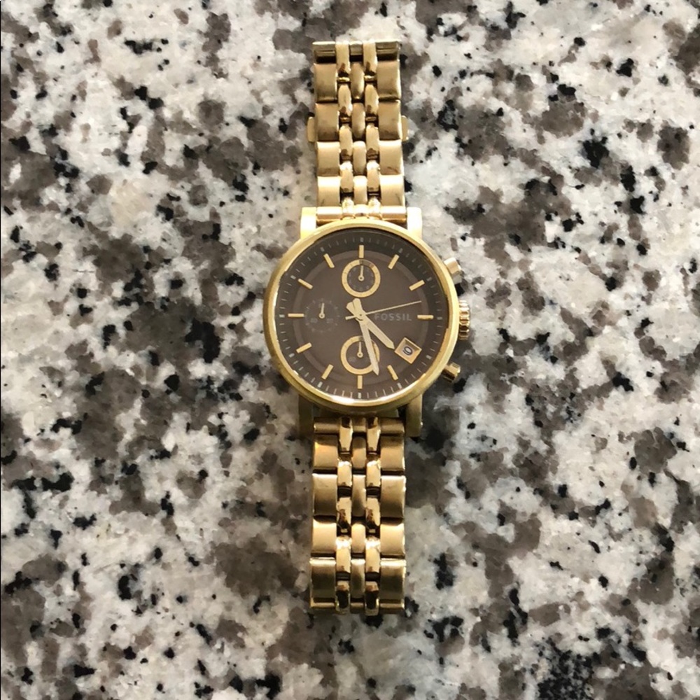 Gold fossil watch